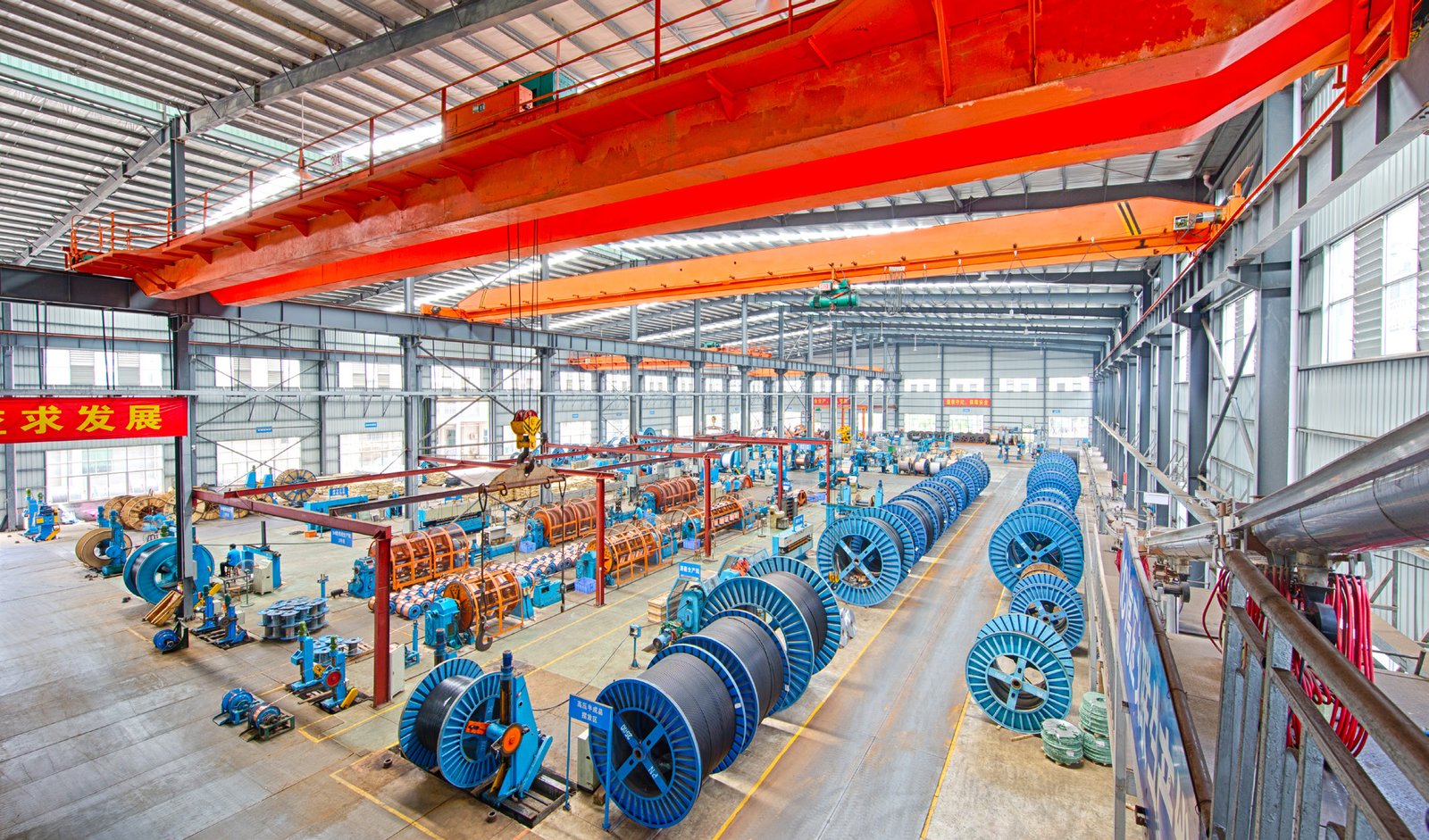 Large cable workshop with stranding lines and overhead cranes